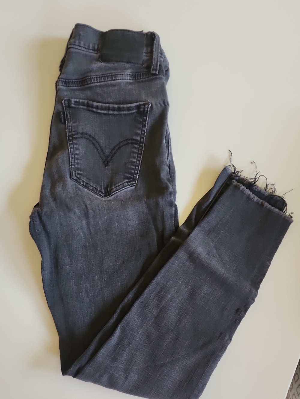 Women’s Dark Gray Frayed Hem Levi Jeans